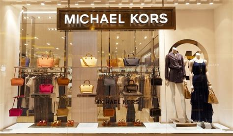 who did michael kors just buy|capri holdings limited brands.